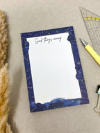 A6 to-do list notepad with floral star design on recycled paper