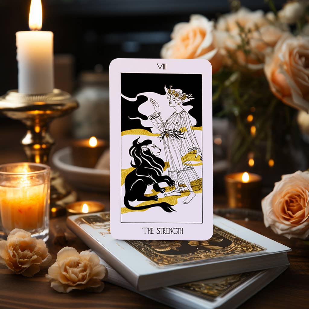 The Golden Path Tarot card Strength featuring lion illustration in Art Deco style