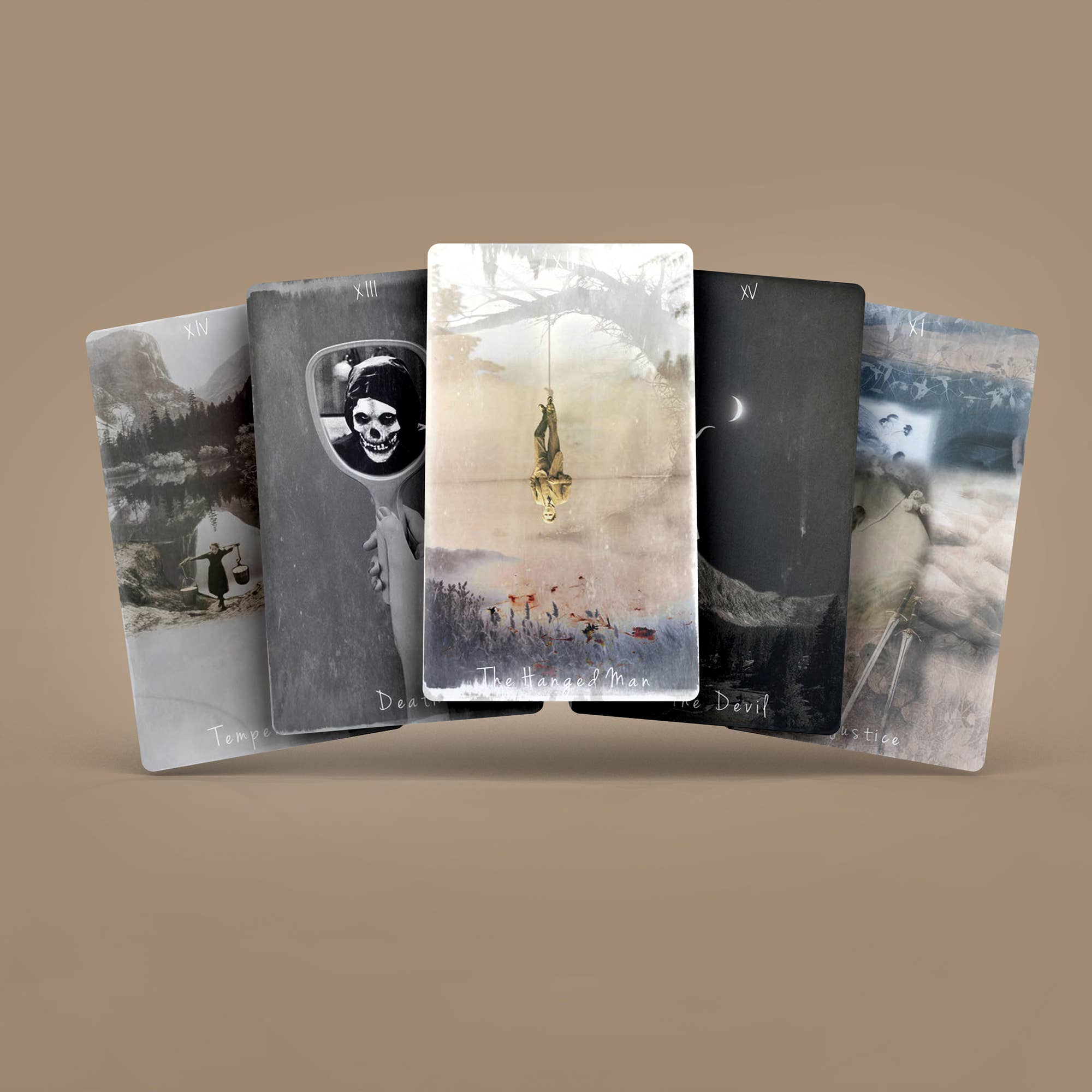 Fan of five Tarot of Unknown Shadows cards showing dark and surreal imagery