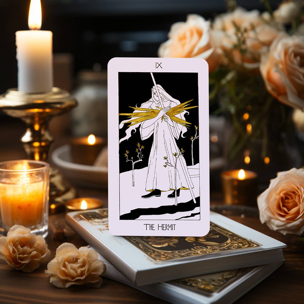Dark Synevyr The Golden Path Tarot Deck 80 Cards - card The Hermit standing on deck box