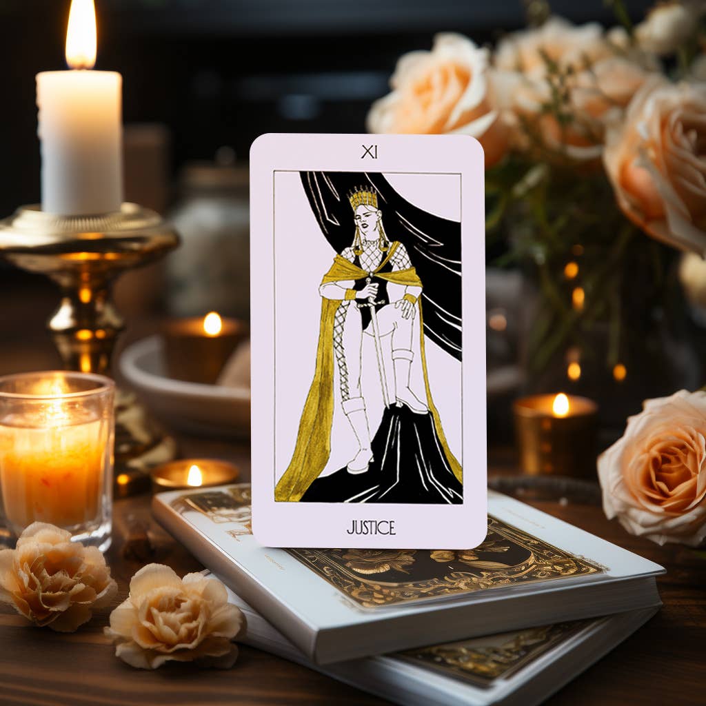 Dark Synevyr The Golden Path Tarot Deck 80 Cards - card Justice displayed with candles and flowers