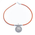 Meninas Bonitas Cork Handmade Cork Necklace 42cm – detail – front view of the orange cork necklace with a round silver-tone pendant.